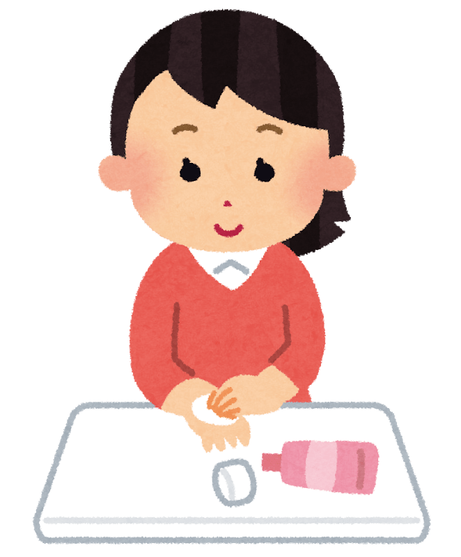 Woman applying hand cream