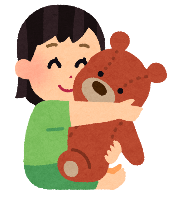 Girl holding a stuffed animal