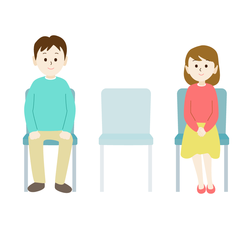 Men and women sitting apart from each other with chairs