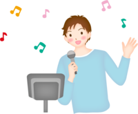 カラオケで唄っている男性