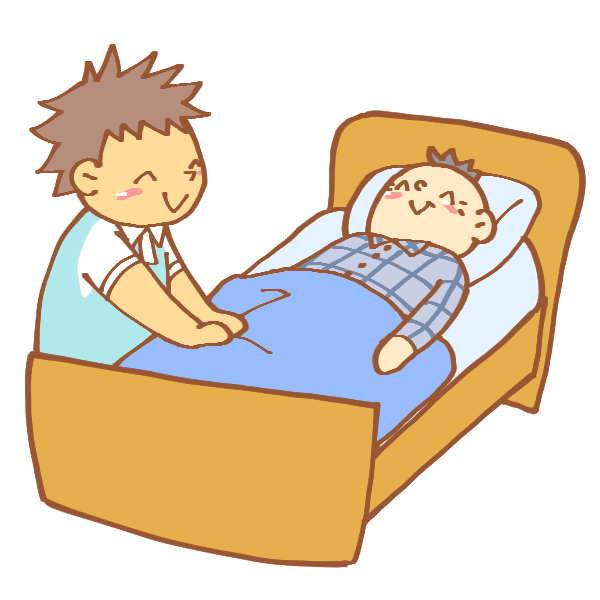 ベッドを整える男性介護士