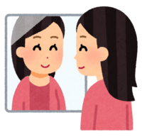 A person looking in the mirror (smiling woman)