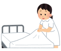 Nurse exchanging sheets