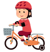 Girl riding a bicycle with training wheels