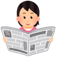 Woman reading a newspaper