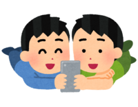 Children looking at smartphones together