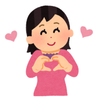 Woman making a heart mark by hand