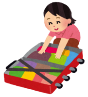 旅行の荷物をまとめている人