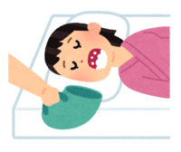 ベッドでうがいをする患者