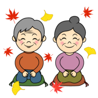 Happy elderly couple in autumn