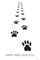 New Year's card of dog footprints following the horizon