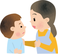 Nursery teacher (female) who talks face to face with children