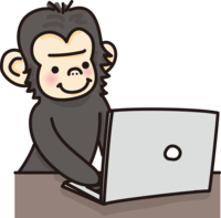 Cute chimpanzee typing on a computer