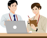 Male employee teaching a computer to a female employee-Businessman