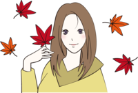 Woman holding autumn leaves (maple)