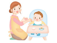 赤ちゃんに離乳食をあげているシーン素材