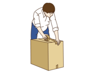 引っ越しで荷造りをしている男性