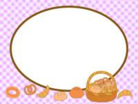 篮子盛的面包和紫色检查的椭圆装饰框
