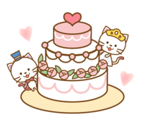 かわいい猫のカップルとウエディングケーキ