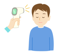 A man who measures the temperature with a non-contact thermometer